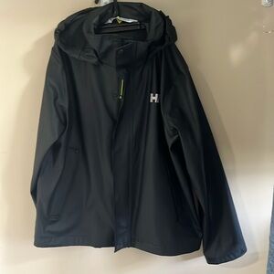 HELLY HANSEN youth size 12 black hooded rain jacket